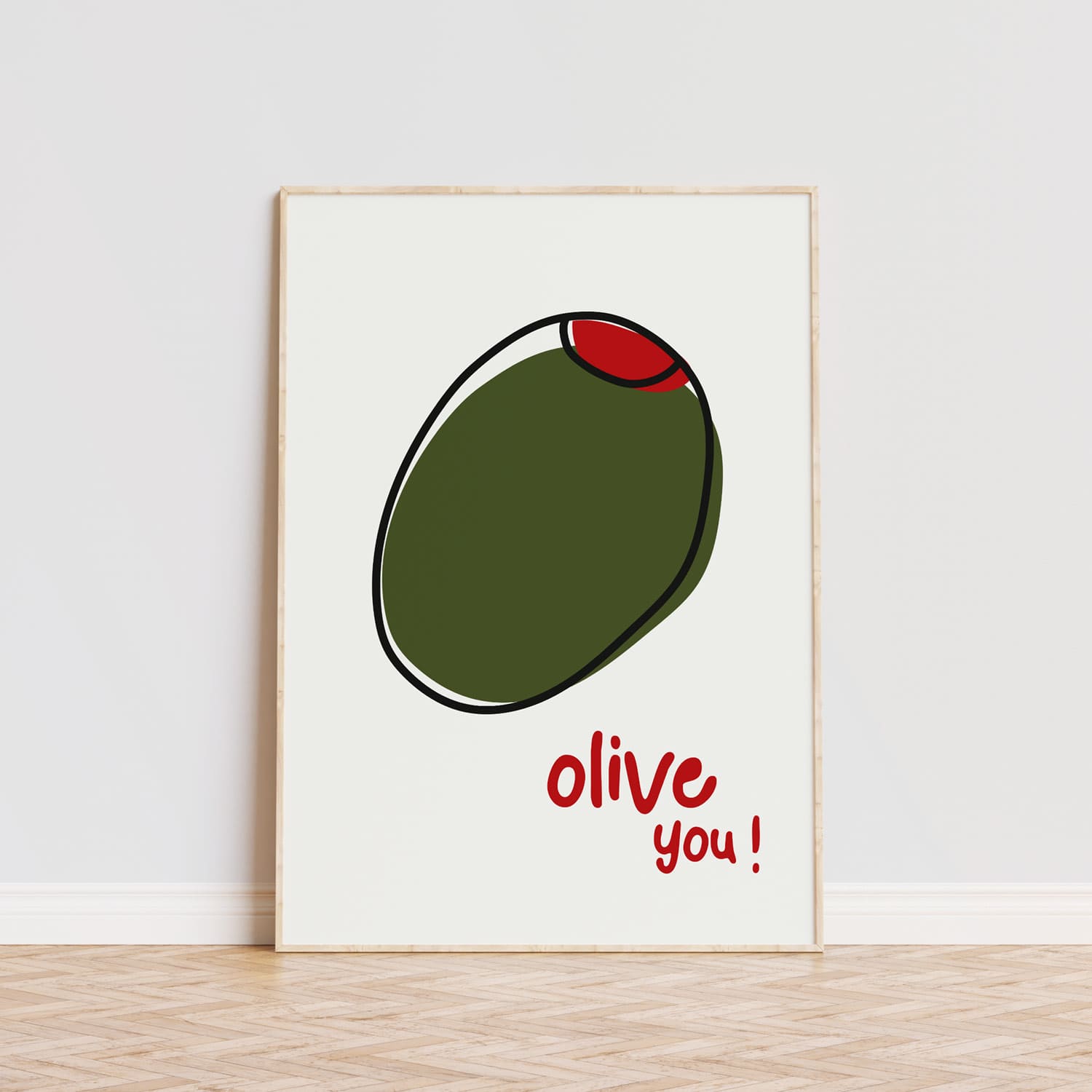 Esta lámina decorativa presenta una aceituna junto a la frase 'Olive you', con una tipografía roja vibrante y un diseño que combina verde oliva y rojo sobre un fondo claro. Es ideal para quienes desean añadir un toque divertido y original a su cocina o comedor. Su estilo fresco y desenfadado aporta personalidad a cualquier pared, siendo perfecta para espacios que buscan una decoración moderna y con un toque de humor. Un detalle único para transformar cualquier ambiente del hogar